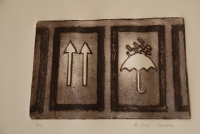 Umbrella and directional arrows etched on layered panels — mixed media print by Elisa Sassera
